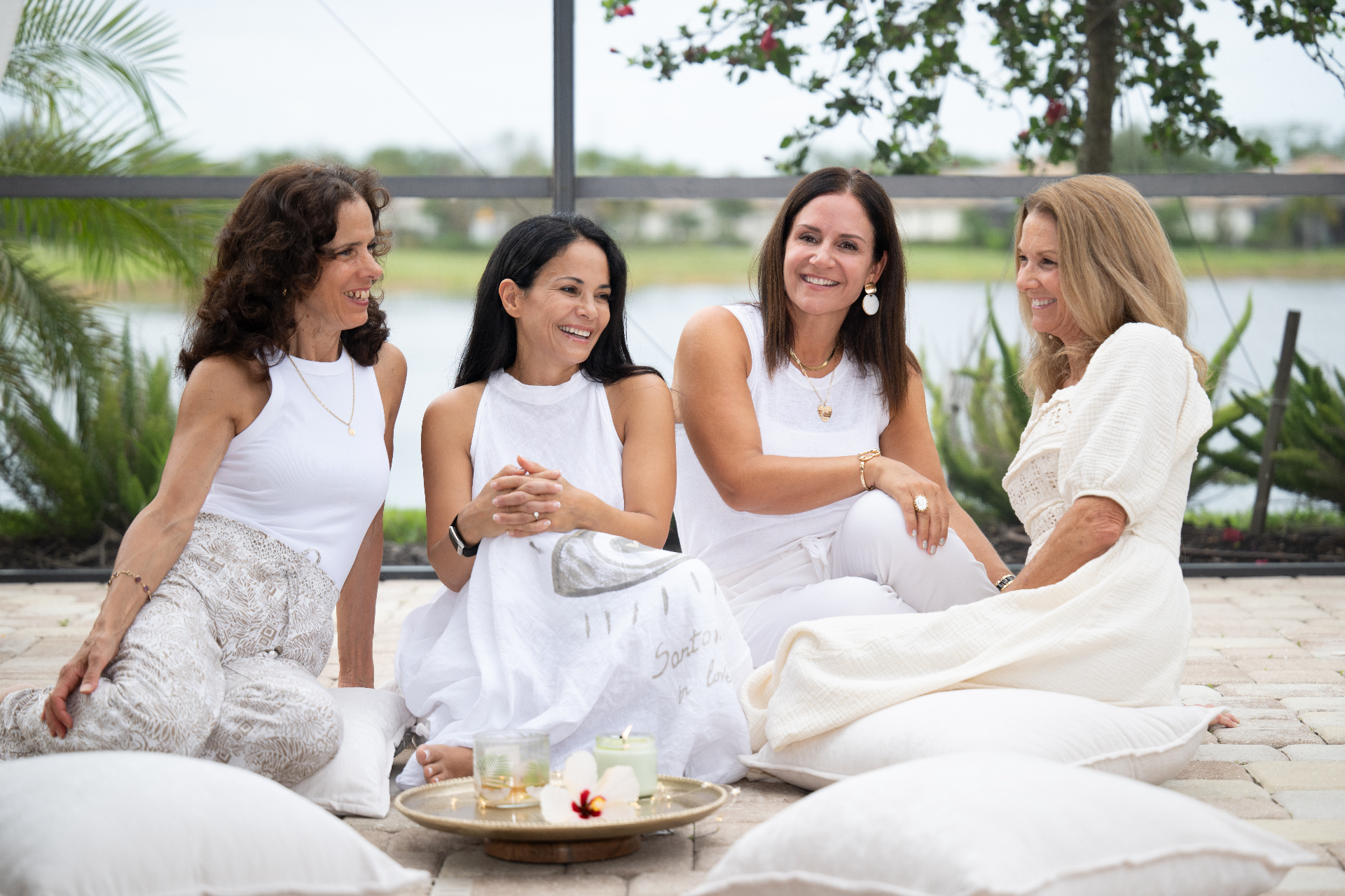 Women gathered in circle at a Happiness Circle gathering